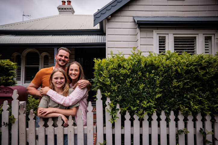 Happy family winning at auction